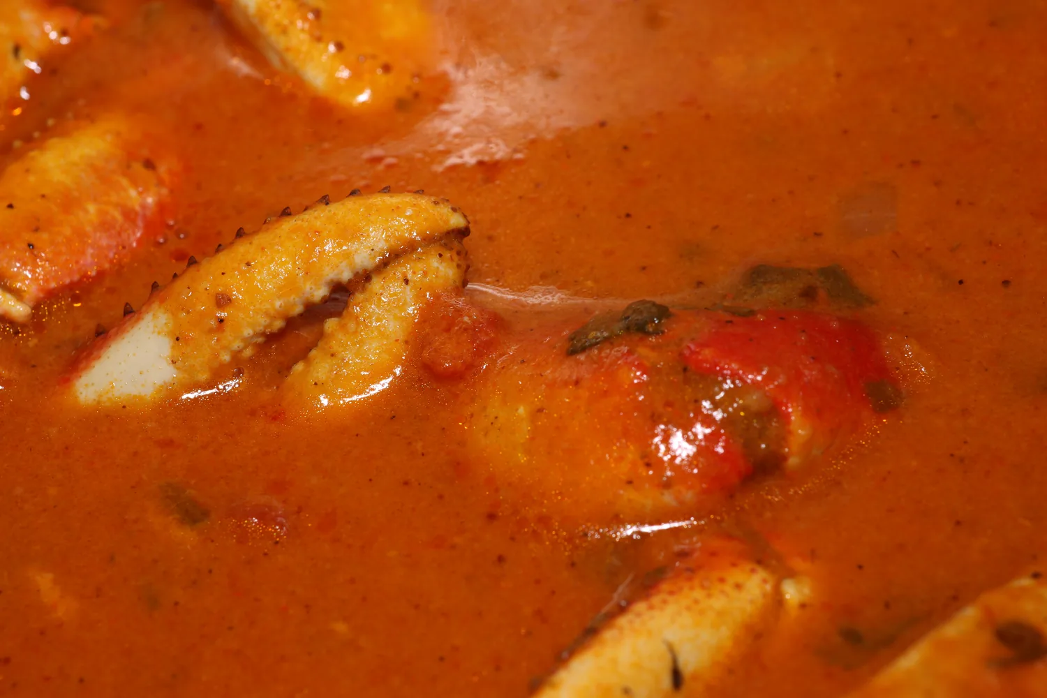 Patas de caranguejo ao molho de coco, prato tradicional do litoral cearense